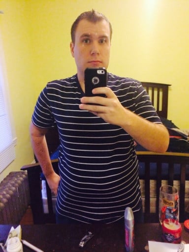 A progress pic of a 5'8" man showing a weight reduction from 261 pounds to 211 pounds. A net loss of 50 pounds.