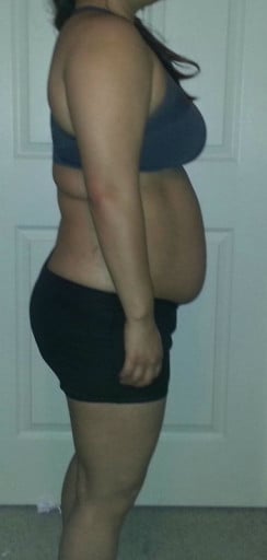 A progress pic of a 5'2" woman showing a snapshot of 165 pounds at a height of 5'2