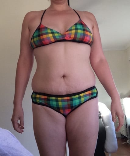 A photo of a 5'8" woman showing a weight loss from 180 pounds to 150 pounds. A respectable loss of 30 pounds.