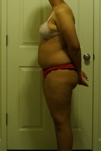 A photo of a 5'4" woman showing a snapshot of 157 pounds at a height of 5'4