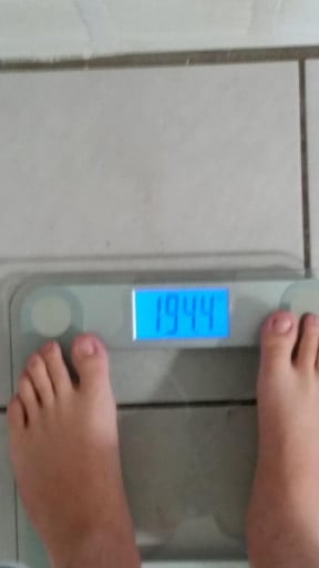 A photo of a 5'9" man showing a weight cut from 230 pounds to 172 pounds. A total loss of 58 pounds.