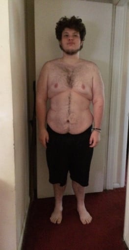 A picture of a 5'11" male showing a weight reduction from 405 pounds to 275 pounds. A net loss of 130 pounds.
