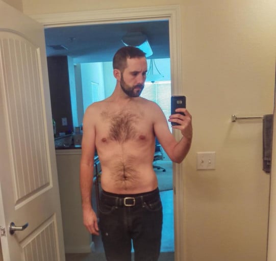 A picture of a 6'1" male showing a weight cut from 215 pounds to 162 pounds. A respectable loss of 53 pounds.