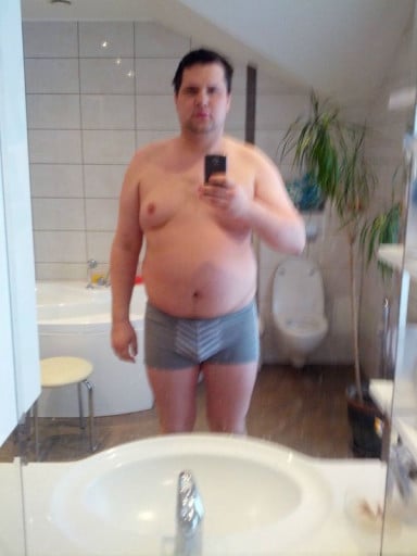 A photo of a 6'4" man showing a weight loss from 291 pounds to 216 pounds. A respectable loss of 75 pounds.