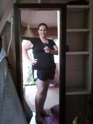 A picture of a 5'4" female showing a weight reduction from 285 pounds to 215 pounds. A net loss of 70 pounds.