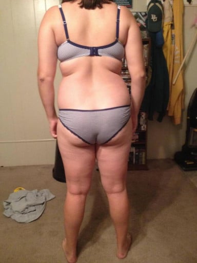 A picture of a 5'4" female showing a snapshot of 165 pounds at a height of 5'4