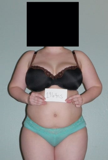 A photo of a 5'2" woman showing a snapshot of 158 pounds at a height of 5'2