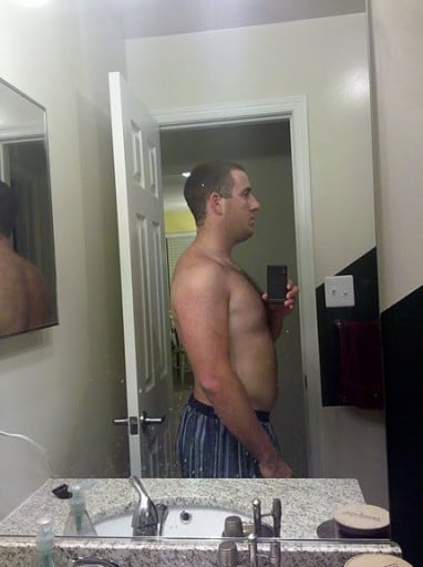 A progress pic of a 5'11" man showing a snapshot of 210 pounds at a height of 5'11