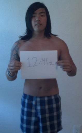 A photo of a 5'9" man showing a snapshot of 157 pounds at a height of 5'9