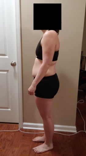 A photo of a 5'2" woman showing a snapshot of 143 pounds at a height of 5'2
