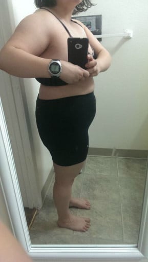 A progress pic of a 4'11" woman showing a snapshot of 153 pounds at a height of 4'11