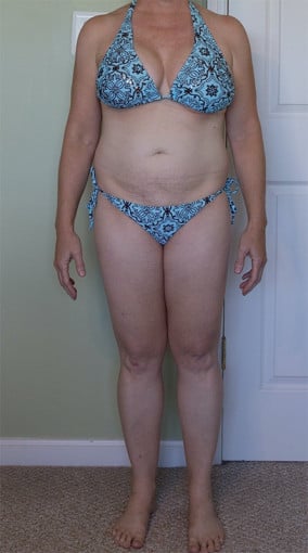 A progress pic of a 5'2" woman showing a weight cut from 147 pounds to 135 pounds. A net loss of 12 pounds.