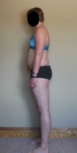 A progress pic of a 5'10" woman showing a snapshot of 194 pounds at a height of 5'10