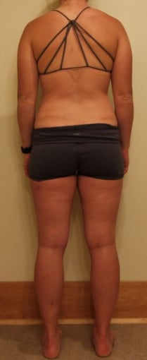 A progress pic of a 5'2" woman showing a snapshot of 132 pounds at a height of 5'2
