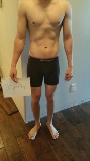 A photo of a 5'11" man showing a snapshot of 140 pounds at a height of 5'11
