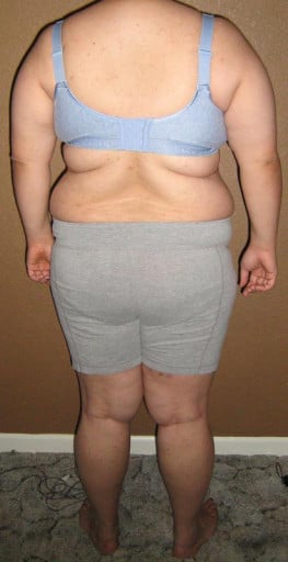 A photo of a 5'3" woman showing a snapshot of 229 pounds at a height of 5'3