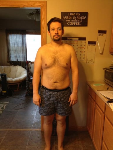 A progress pic of a 5'10" man showing a snapshot of 219 pounds at a height of 5'10