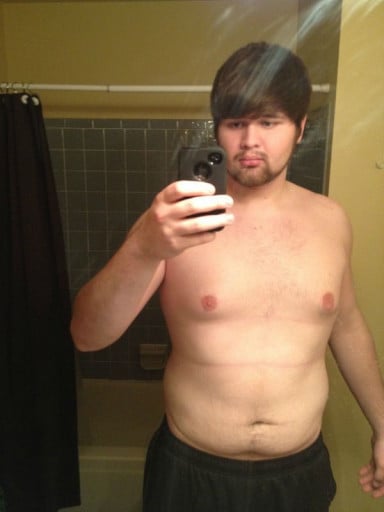 A picture of a 6'4" male showing a weight reduction from 295 pounds to 212 pounds. A respectable loss of 83 pounds.