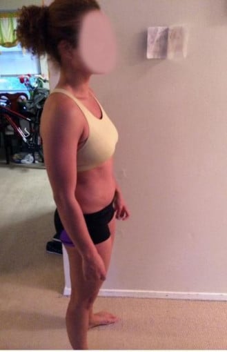 A photo of a 5'2" woman showing a fat loss from 130 pounds to 121 pounds. A respectable loss of 9 pounds.