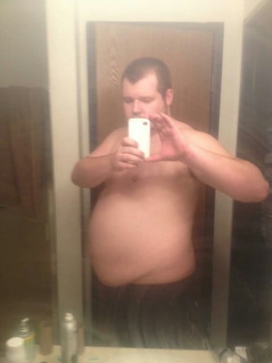 A picture of a 6'3" male showing a weight cut from 321 pounds to 262 pounds. A respectable loss of 59 pounds.