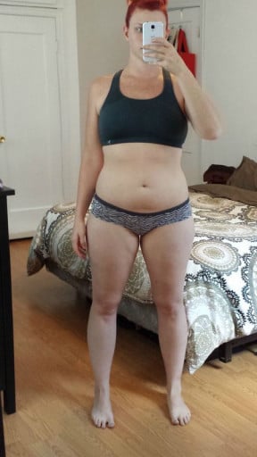 A picture of a 5'7" female showing a snapshot of 164 pounds at a height of 5'7