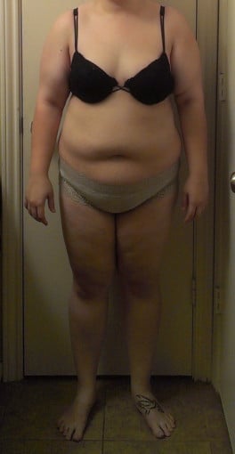 A progress pic of a 5'5" woman showing a snapshot of 235 pounds at a height of 5'5