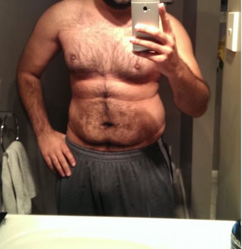 A photo of a 6'0" man showing a weight reduction from 248 pounds to 227 pounds. A net loss of 21 pounds.