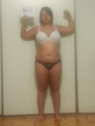 A picture of a 5'2" female showing a snapshot of 164 pounds at a height of 5'2