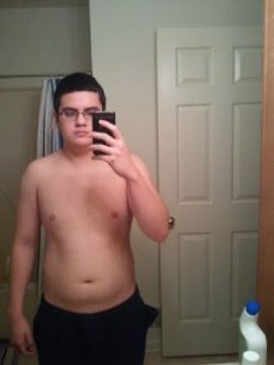 A picture of a 5'9" male showing a weight reduction from 190 pounds to 156 pounds. A total loss of 34 pounds.