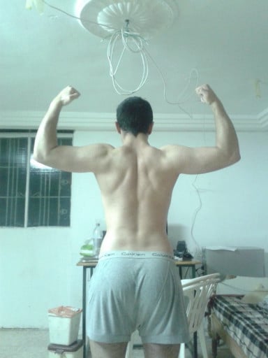 A picture of a 5'7" male showing a muscle gain from 143 pounds to 165 pounds. A total gain of 22 pounds.