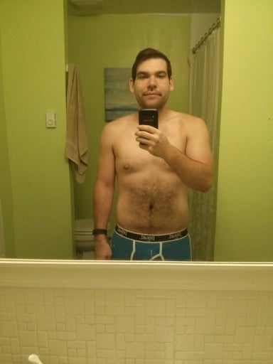 A picture of a 5'8" male showing a weight loss from 255 pounds to 184 pounds. A net loss of 71 pounds.