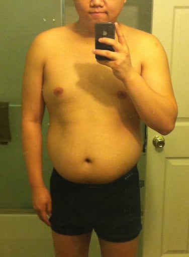 A progress pic of a 5'11" man showing a snapshot of 235 pounds at a height of 5'11