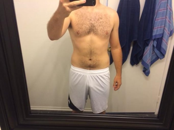 A photo of a 5'11" man showing a fat loss from 215 pounds to 185 pounds. A net loss of 30 pounds.
