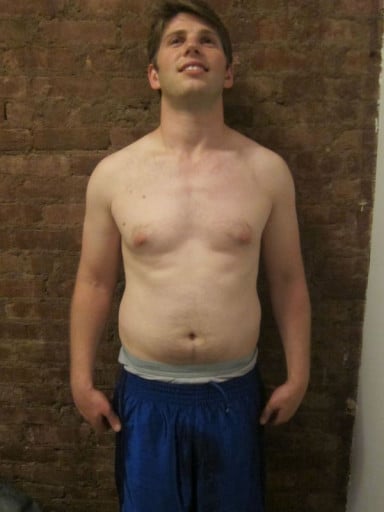 A picture of a 5'11" male showing a weight reduction from 175 pounds to 168 pounds. A net loss of 7 pounds.