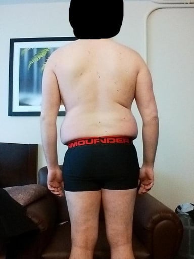 A before and after photo of a 6'0" male showing a snapshot of 215 pounds at a height of 6'0