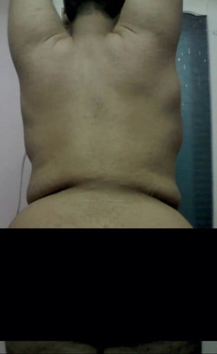 A picture of a 5'8" male showing a fat loss from 380 pounds to 183 pounds. A net loss of 197 pounds.