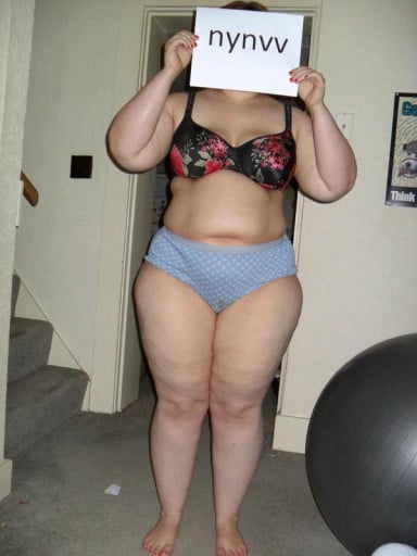 A progress pic of a 5'3" woman showing a snapshot of 232 pounds at a height of 5'3