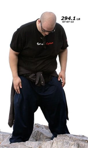 A photo of a 5'11" man showing a weight reduction from 400 pounds to 285 pounds. A net loss of 115 pounds.