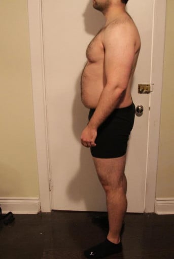 A picture of a 6'1" male showing a snapshot of 239 pounds at a height of 6'1
