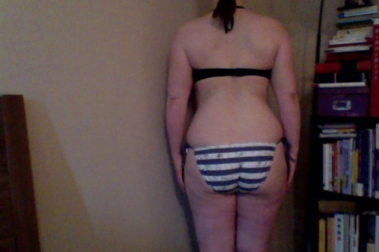 A photo of a 5'2" woman showing a fat loss from 169 pounds to 146 pounds. A respectable loss of 23 pounds.