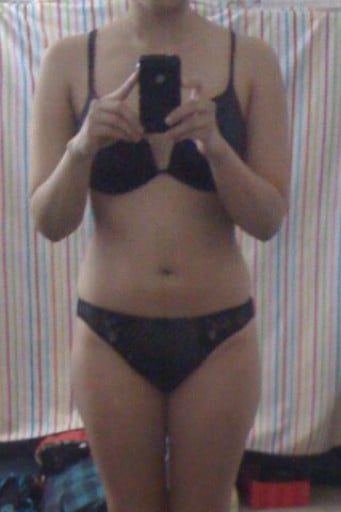 A picture of a 5'3" female showing a weight loss from 142 pounds to 122 pounds. A respectable loss of 20 pounds.