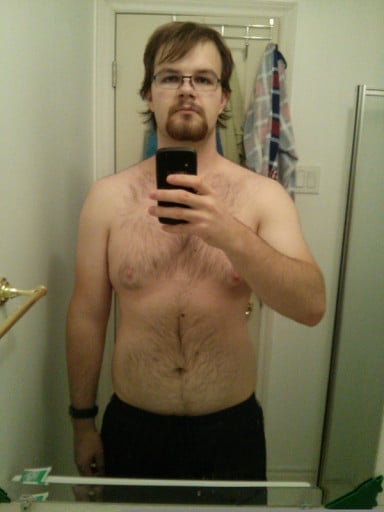 A photo of a 5'10" man showing a weight loss from 264 pounds to 199 pounds. A net loss of 65 pounds.
