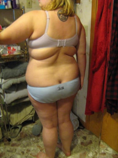 A progress pic of a 5'4" woman showing a snapshot of 244 pounds at a height of 5'4