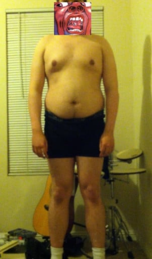 A progress pic of a 6'1" man showing a snapshot of 239 pounds at a height of 6'1