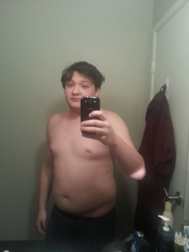 A photo of a 5'9" man showing a weight cut from 230 pounds to 172 pounds. A total loss of 58 pounds.