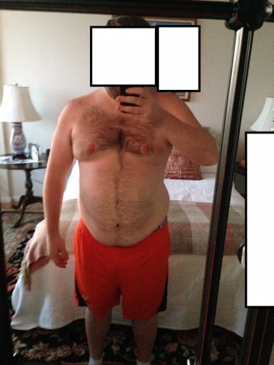 A photo of a 5'9" man showing a weight loss from 310 pounds to 252 pounds. A net loss of 58 pounds.