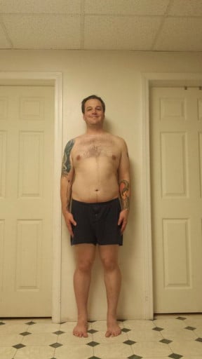 A photo of a 5'11" man showing a snapshot of 230 pounds at a height of 5'11