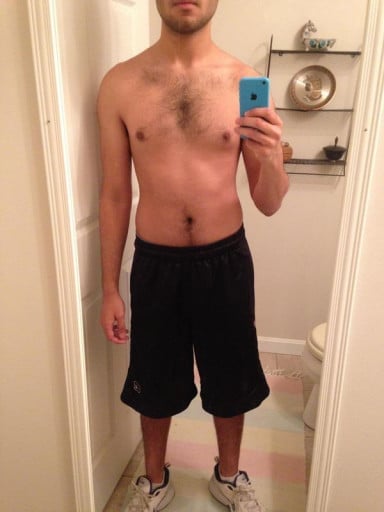A photo of a 5'8" man showing a snapshot of 139 pounds at a height of 5'8
