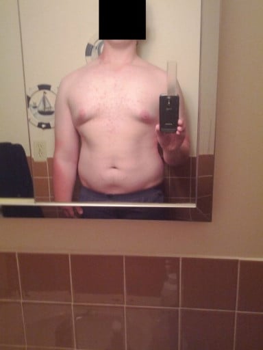 A before and after photo of a 6'6" male showing a weight loss from 305 pounds to 260 pounds. A net loss of 45 pounds.