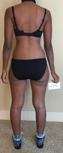 A progress pic of a 5'2" woman showing a snapshot of 107 pounds at a height of 5'2